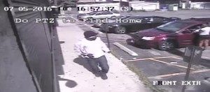 Surveillance image of a man wanted for the fatal shooting of a Family Dollar manager and a June armed robbery on the South Side. | Chicago Police