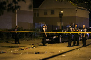 Chicago Police investigate in the 1300 block of West Hastings, where gunfire rang out during a birthday party, leaving a 43-year-old man dead and a 40-year-old woman injured early Sunday. | Ashlee Rezin/Sun-Times