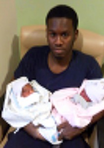 James Austin with his twin daughters