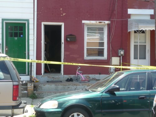 Police guarded this home in the first block of Cummings Avenue were a man was shot and killed. June 24, 2015 (Penny Ray - Trentonian)