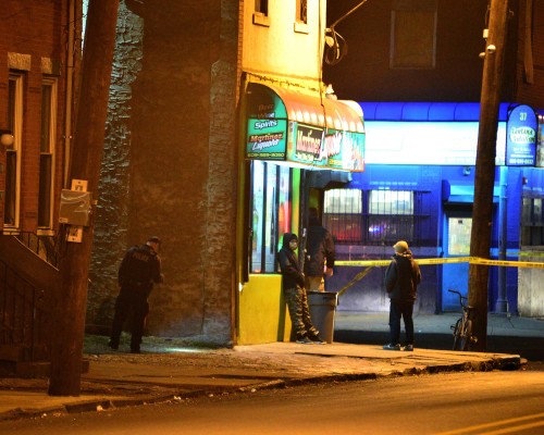 Police investigate a shooting in the area of Chambers Street and Walnut Avenue after a shooting on Saturday evening just after 6 p.m. on Jan. 9, 2016. (Scott Ketterer- The Trentonian)